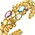 النگو طلای زرد با نگین توپاز، آمتیس، زبرجد و یاقوت قرمز: مدل bgm1019