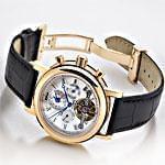 ساعت طلای زرد و بند چرم مشکی