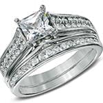 حلقه و پشت حلقه طلای زنانه با نگین تخمه الماس پرنس و برلیان دیواره مدل: RDF1085