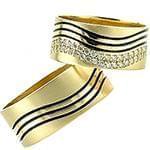 حلقه ست ازدواج طلای زرد با نگین الماس تراش برلیان مدل: srd1389