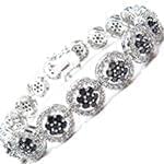 دستبند طلا زنانه با نگین یاقوت کبود و الماس تراش برلیان مدل: bdf1209