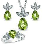 نیم ست آویز، گوشواره و انگشتر با نگین زبرجد و الماس تراش برلیان طرح گل مدل: hsdf1369