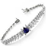 دستبند طلا زنانه با نگین یاقوت کبود و الماس تراش برلیان مدل: bdf12402