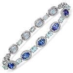 دستبند طلا زنانه با نگین الماس تراش برلیان، یاقوت کبود و توپاز مدل: bdf1248