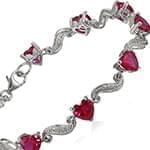 دستبند زنانه طلا با نگین الماس تراش برلیان و یاقوت قرمز طرح قلب مدل: bdf1260