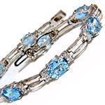 دستبند طلای زنانه با نگین الماس تراش برلیان و توپاز مدل: bdf1269