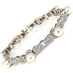 دستبند طلای زنانه با نگین الماس تراش برلیان و مروارید مدل: bdf1276