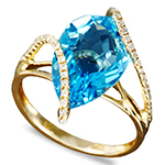 انگشتر توپاز و برلیان زنانه با طلای زرد 18 عیار طرح تابیده :مدل rgf1634 