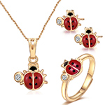 نیم ست طلای کودک طرح کفش دوزک الماس تراش برلیان و میناکاری مدل pgb2227