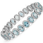 دستبند جواهر زنانه طلا سفید 18 عیار با نگین توپاز تراش اوال و الماس تراش برلیان مدل: bdf1233