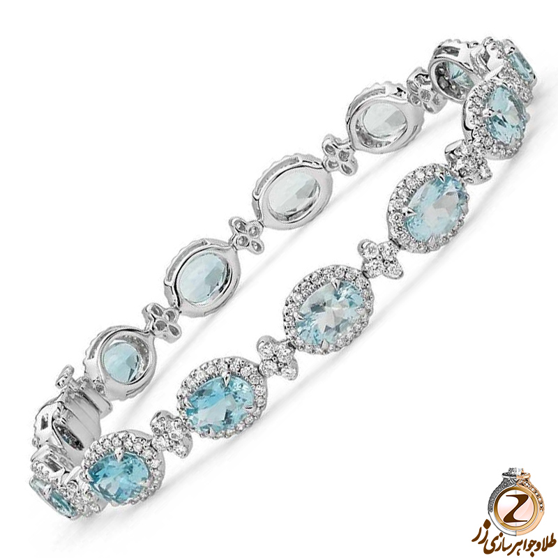دستبند طلا سفید جواهر زنانه با نگین الماس تراش برلیان و توپاز طرح شیک 
