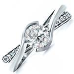 حلقه ازدواج زنانه با نگین الماس تراش اوال و برلیان و طلای سفید مدل vzg1003