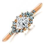انگشتر طلای زنانه با نگین الماس تراش پرنس و توپاز مدل vzg1018